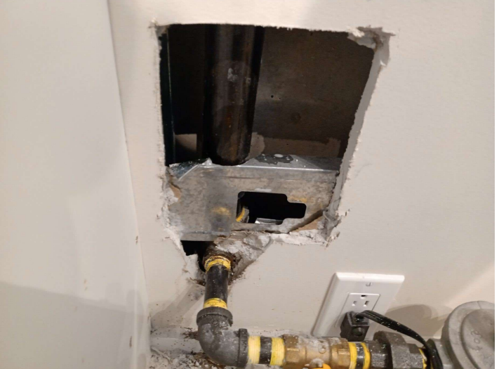 gas line behind wall